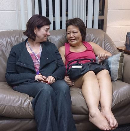 Donna Hodges gets helpful tips from Cynthia White.
